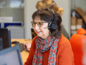 Helpline nurse taking a call